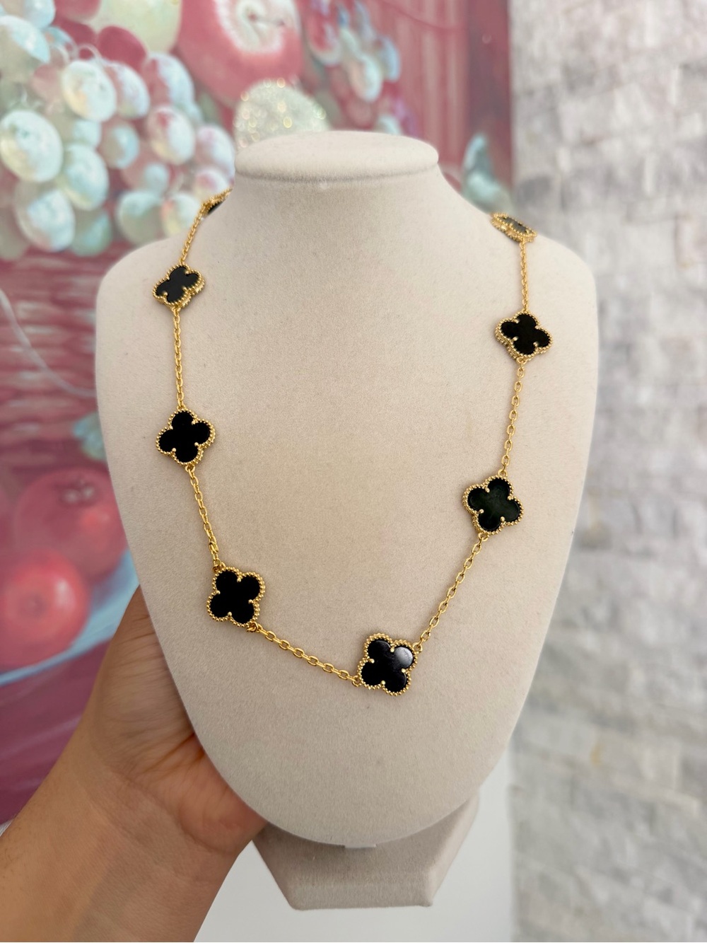 Gold Chain Necklace with Black Four-Leaf Clover Motifs